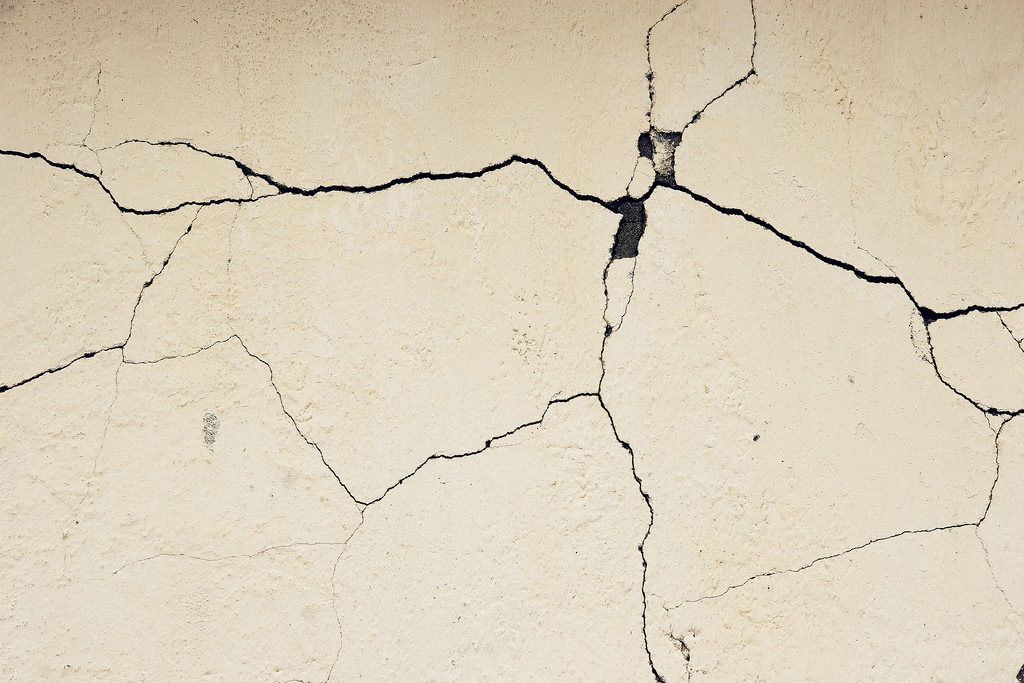 Cracks in Wall Photo Credit: Jens Karlsson (Flickr).